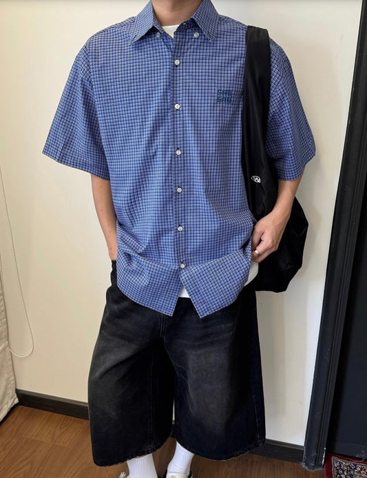 Chemise à carreaux manches courtes
